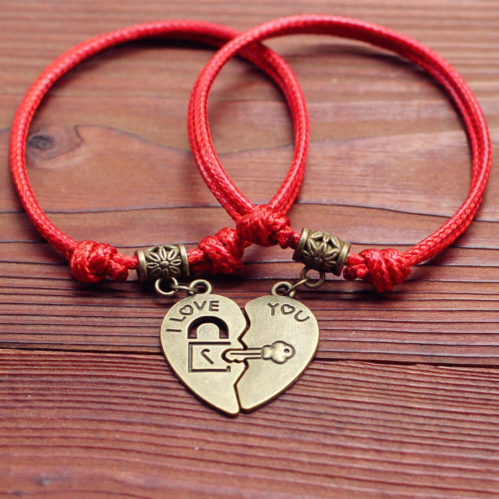Couple bracelets from Lazynn Jewelry Store featuring a love heart pendant with lock and key design.
