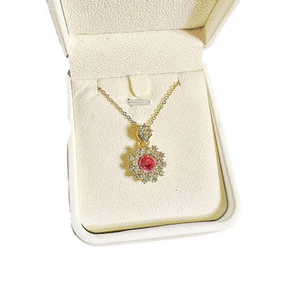 Women's Pomegranate Red Rings Pendants Earings Set displayed with necklace, earrings, and ring in gold and red design.